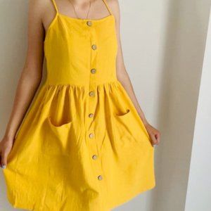 Yellow buttoned dress